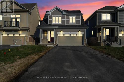 76 Oakmont Drive, Loyalist, ON - Outdoor With Facade