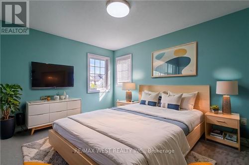 69 Kidd Crescent, New Tecumseth, ON - Indoor Photo Showing Bedroom