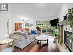 Bright open concept living with gas fireplace - 