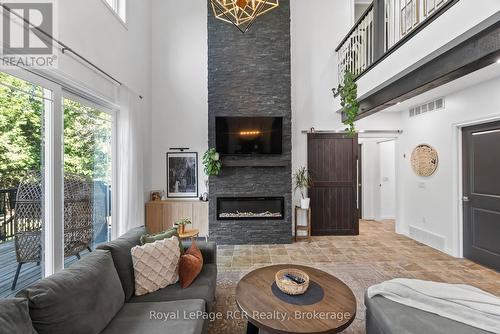39626 Glenannon Road, Morris Turnberry (Turnberry), ON - Indoor Photo Showing Living Room With Fireplace