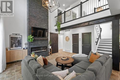 39626 Glenannon Road, Morris Turnberry (Turnberry), ON - Indoor Photo Showing Living Room With Fireplace