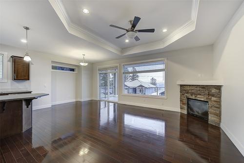 9829 Crimson Road, Lake Country, BC - Indoor With Fireplace