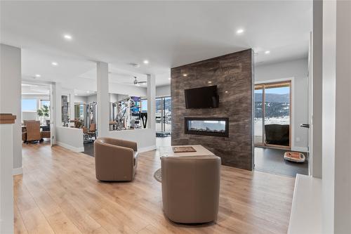 608 Mt Ida Crescent, Coldstream, BC - Indoor Photo Showing Living Room With Fireplace
