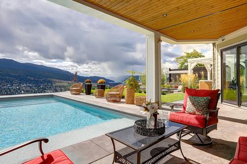 608 Mt Ida Crescent, Coldstream, BC - Outdoor With In Ground Pool With Deck Patio Veranda With Exterior