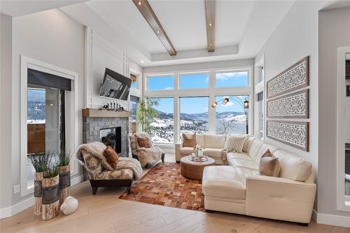 608 Mt Ida Crescent, Coldstream, BC - Indoor Photo Showing Living Room With Fireplace