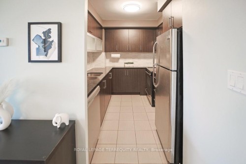 411-275 Yorkland Road, Toronto, ON - Indoor Photo Showing Kitchen With Double Sink