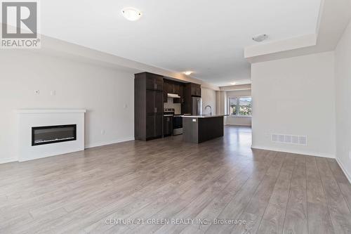 142 Landsbridge Street, Caledon, ON - Indoor Photo Showing Living Room With Fireplace