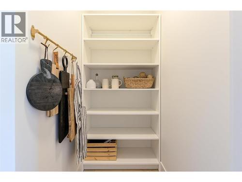 Walk in Pantry. Staged photos are of 759 Barnaby Rd - 761 Barnaby Road, Kelowna, BC - Indoor With Storage