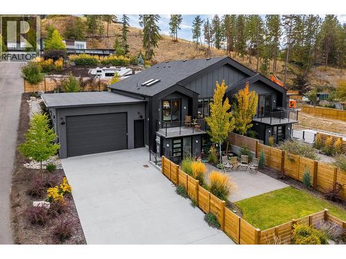 Plenty of parking on the driveway and an oversized garage - 761 Barnaby Road, Kelowna, BC - Outdoor