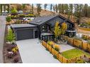 Plenty of parking on the driveway and an oversized garage - 761 Barnaby Road, Kelowna, BC  - Outdoor 