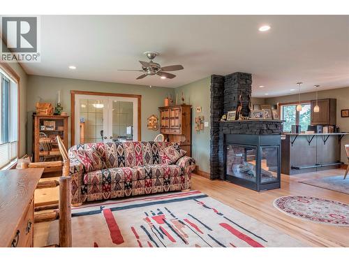 7800 Howe Drive, Coldstream, BC - Indoor Photo Showing Living Room With Fireplace