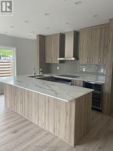 119 - 402 The East Mall, Toronto, ON - Indoor Photo Showing Kitchen With Double Sink