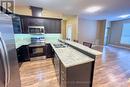 306 - 2799 St. Paul Avenue, Niagara Falls (Stamford), ON  - Indoor Photo Showing Kitchen With Stainless Steel Kitchen With Double Sink With Upgraded Kitchen 