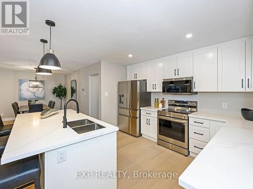 6921 Avila Road, Mississauga, ON - Indoor Photo Showing Kitchen With Stainless Steel Kitchen With Double Sink