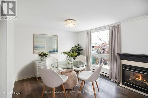 9A - 25 Britten Close, Hamilton, ON - Indoor Photo Showing Dining Room With Fireplace
