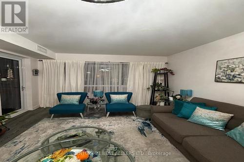 218 - 1050 Main Street E, Milton, ON - Indoor Photo Showing Living Room