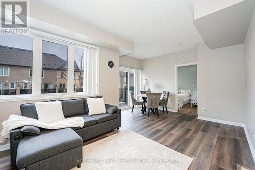 213 - 3075 Thomas Street, Mississauga, ON - Indoor Photo Showing Living Room