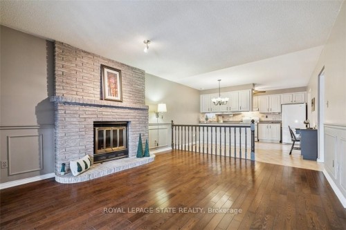 10 Finch Place, Hamilton, ON - Indoor Photo Showing Living Room With Fireplace