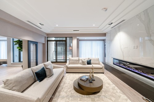 109-293 The Kingsway N/A, Toronto, ON - Indoor Photo Showing Living Room With Fireplace