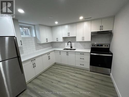 Basement - 670 Emerson Court, Oshawa (Donevan), ON - Indoor Photo Showing Kitchen With Double Sink