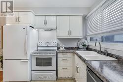 View of kitchen from foyer - 