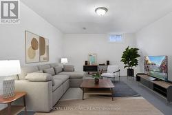 Basement rec room, virtually staged - 