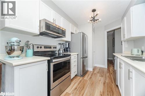 100 Millside Drive Unit# 1003, Milton, ON - Indoor Photo Showing Kitchen With Stainless Steel Kitchen