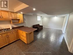 Basement kitchen & common area w/ heated floors - 