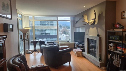503-38 Front St, Nanaimo, BC - Indoor Photo Showing Living Room With Fireplace