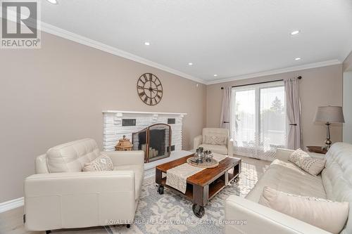 6 Hollis Crescent, East Gwillimbury, ON - Indoor Photo Showing Living Room With Fireplace