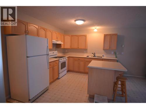 1 1686 Main Street, Smithers, BC - Indoor Photo Showing Kitchen With Double Sink