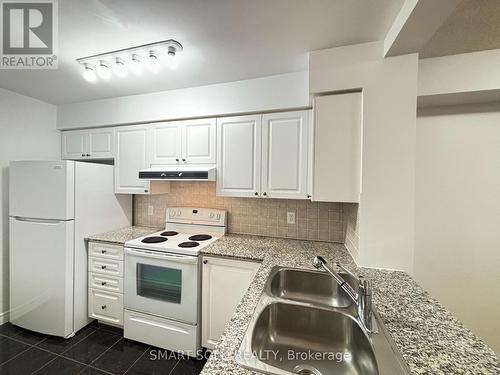 2310 - 83 Borough Drive, Toronto, ON - Indoor Photo Showing Kitchen With Double Sink