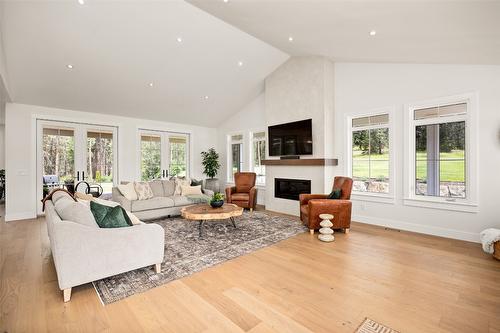 4135 June Springs Road, Kelowna, BC - Indoor Photo Showing Living Room With Fireplace