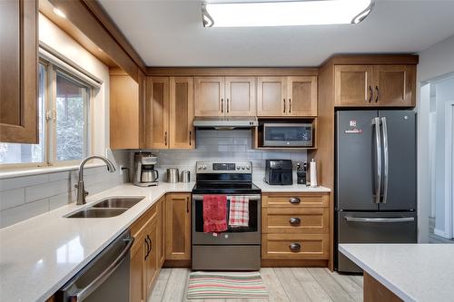 302-2130 Vasile Road, Kelowna, BC - Indoor Photo Showing Kitchen With Double Sink