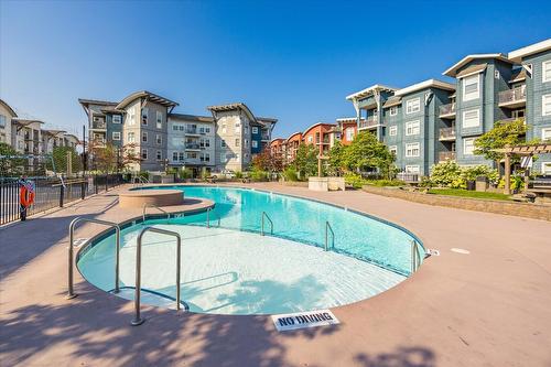 202-563 Yates Road, Kelowna, BC - Outdoor With In Ground Pool