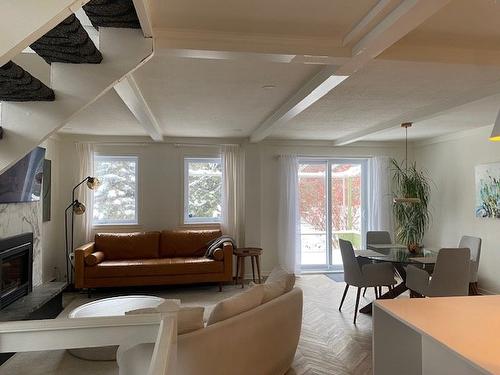 Salon - 29 Av. Turcot, Saint-Sauveur, QC - Indoor Photo Showing Living Room With Fireplace