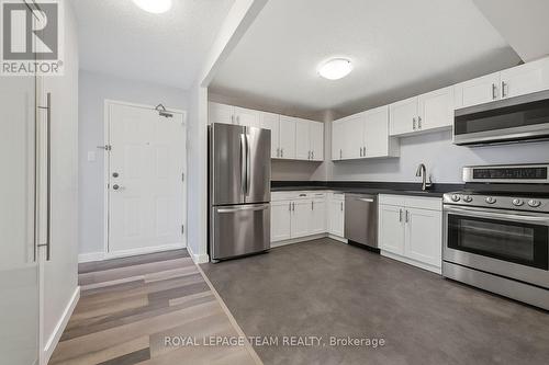 Photo is virtually emptied of decor & furnishings - 901 - 200 Bay Street, Ottawa, ON - Indoor Photo Showing Kitchen