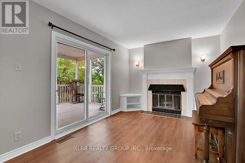 12 John Sidney Crescent, Ottawa, ON - Indoor Photo Showing Living Room With Fireplace