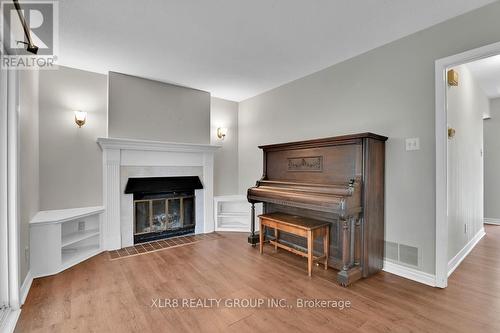 12 John Sidney Crescent, Ottawa, ON - Indoor Photo Showing Living Room With Fireplace