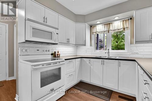 12 John Sidney Crescent, Ottawa, ON - Indoor Photo Showing Kitchen With Double Sink