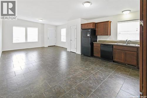 B 8470 Howard Avenue, Gull Lake, SK - Indoor Photo Showing Kitchen With Double Sink