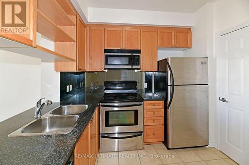 1104 - 2325 Central Park Drive, Oakville, ON - Indoor Photo Showing Kitchen With Double Sink