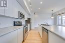 347 - 3066 Sixth Line, Oakville, ON  - Indoor Photo Showing Kitchen With Stainless Steel Kitchen With Double Sink With Upgraded Kitchen 