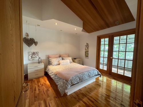 Chambre à coucher principale - 661 Ch. Du Lac-Connelly, Saint-Hippolyte, QC - Indoor Photo Showing Bedroom