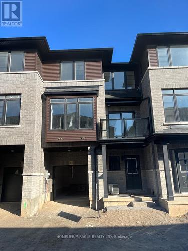 88 - 461 Blackburn Drive, Brantford, ON - Outdoor With Balcony With Facade
