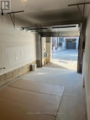 88 - 461 Blackburn Drive, Brantford, ON - Indoor Photo Showing Garage