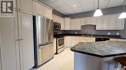 3 2 Fraser Avenue, Craven, SK - Indoor Photo Showing Kitchen With Double Sink