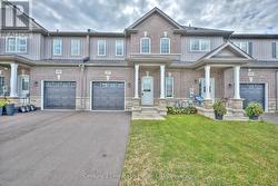 Front view of the  house with garage - 