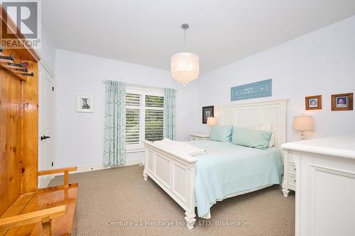Bedroom with large window - 32 Sunrise Court, Fort Erie (Ridgeway), ON - Indoor Photo Showing Bedroom