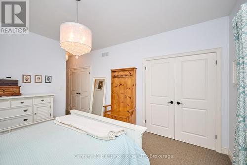 Bedroom with double closets - 32 Sunrise Court, Fort Erie (Ridgeway), ON - Indoor Photo Showing Bedroom